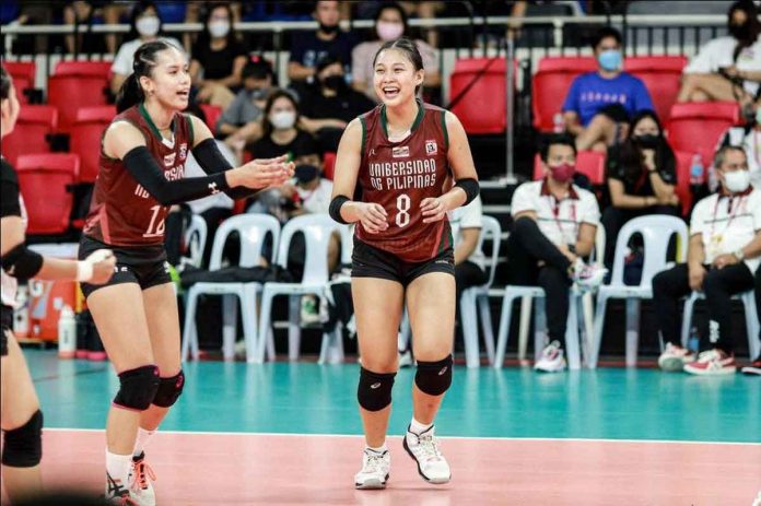 Bacolodnon Joan Marie Monares of University of the Philippines Fighting Maroons rejoices after scoring a point against the San Beda University Lady Red Spikers. SHAKEY’S SUPER LEAGUE PHOTO