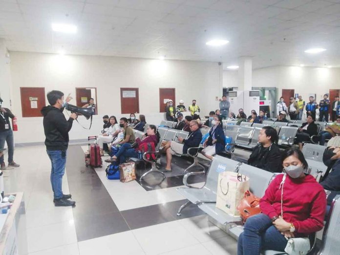 The Bacolod City Disaster Risk Reduction and Management Office (DRRMO) records around 116 Iloilo-bound travelers stranded at the BREDCO port. DRRMO BACOLOD CITY FB PHOTO