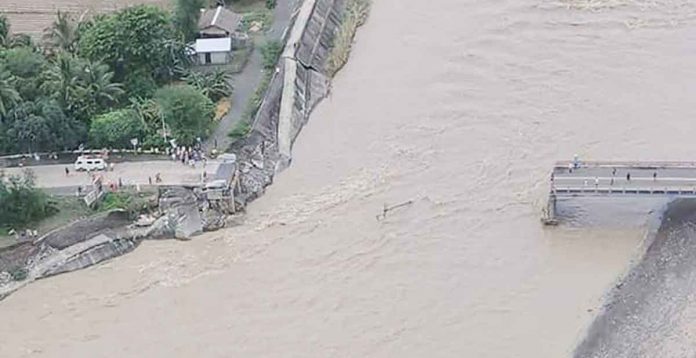 The Antique Provincial Disaster Risk Reduction Management Council headed by Gov. Rhodora Cadiao, together with Office of Civil Defense Region 6 director Jose Roberto Nuñez, conducted aerial inspection of the towns of Belison, Patnongon, San Remigio, Laua-an, Sibalom, and Bugasong in the aftermath of Tropical Storm “Paeng” in the province. Photo shows the Paliwan Bridge that collapsed on Saturday morning, Oct. 29. PROVINCE OF ANTIQUE FB PAGE PHOTO