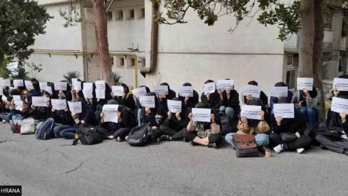 A photo posted by Iran’s Human Rights Activists News Agency shows a sit-in strike by students at the women-only Al-Zahra University in Tehran.