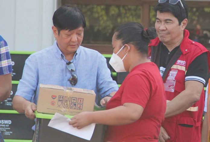 President Ferdinand “Bongbong” Marcos Jr. visits Antique on Tuesday, Nov. 8, to assess and address the extent of damage caused by Severe Tropical Storm “Paeng”. Photo shows Marcos (2nd from left) leading the distribution of family food packs and sleeping kits to affected residents. The President, through the Department of Social Welfare and Development, also extends financial aid of P5,000 each to around 1,200 “Paeng”-hit Antiqueños. PROVINCE OF ANTIQUE FB PAGE PHOTO