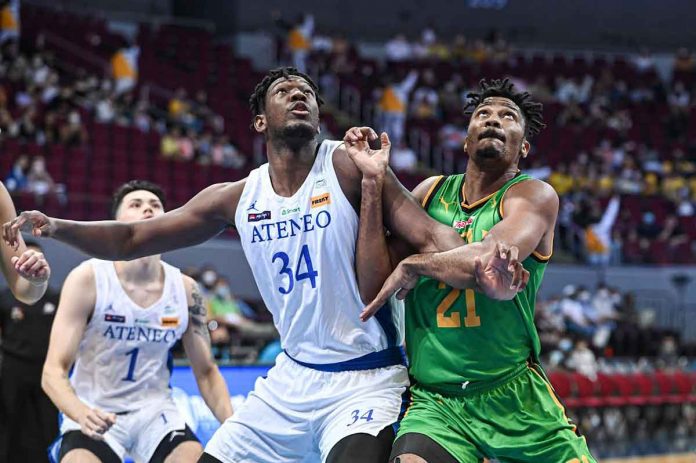 Ateneo de Manila University Blue Eagles’ Angelo Kouame battles Far Eastern University Tamaraws’ Patrick Tchuente for positioning for a rebound. UAAP MEDIA BUREAU PHOTO