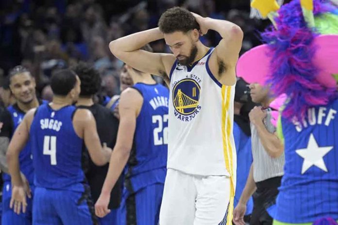 Golden State Warriors' Klay Thompson reacts after missing a last-second basket at the end of an NBA basketball game against the Orlando Magic. AP PHOTO/PHELAN M. EBENHACK