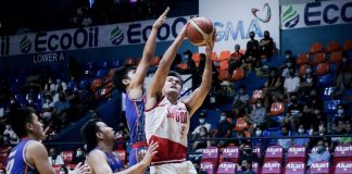 San Beda University Red Lions’ John Bahio goes for an inside hit against an Arellano University Chiefs defender. PHOTO BY NCAA/GMA SPORTS