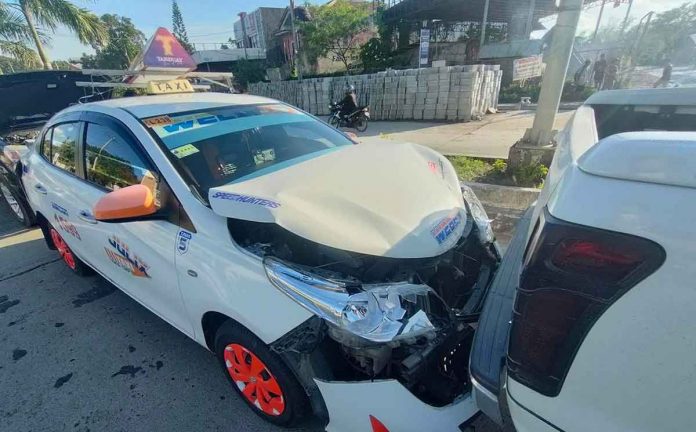 A taxi, pickup and sport utility vehicle collided on Wednesday morning on the national highway in Barangay Mali-ao, Pavia, Iloilo. AJ PALCULLO/PN