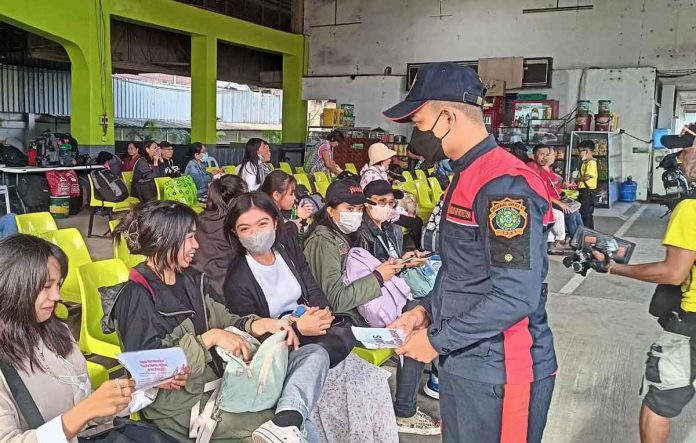 Bureau of Fire Protection Region 6 intensifies its fire prevention and fire safety awareness campaign – "OPLAN PAALALA: IWAS PAPUTOK 2022" – through rekorida, fire truck visibility, and continuous dissemination and distribution of fire safety leaflets all over the region. Photo shows a fire officer distributing fire safety leaflets to passengers in a transport terminal. BFP-6 PUBLIC INFORMATION UNIT PHOTO