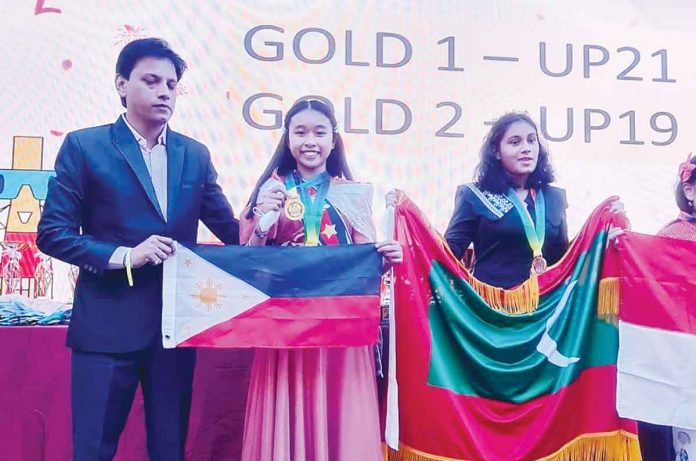 Ellen Charice Valdemar Arevalo, a Grade 7 student of Capiz National High School, wins big in 2022 International Math and Science Competition in Singapore. BM AREVALO PHOTO