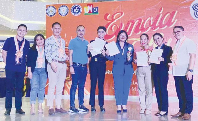 (From left to right) Prof. Esperval Cezhar H. Cadiao, Ms. Viennie Marie J. Carmona, Dr. Nestor Paul M. Pingil, Mr. Buenavides, Charles Matthew Buenavides, Jacqui Antes, Mrs. Escanlar, Althea Escanlar, and Dr. Danilo M. Parreno.