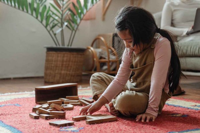 Photo by Ketut Subiyanto: https://www.pexels.com/photo/girl-playing-tower-game-game-near-mother-with-laptop-4473888/