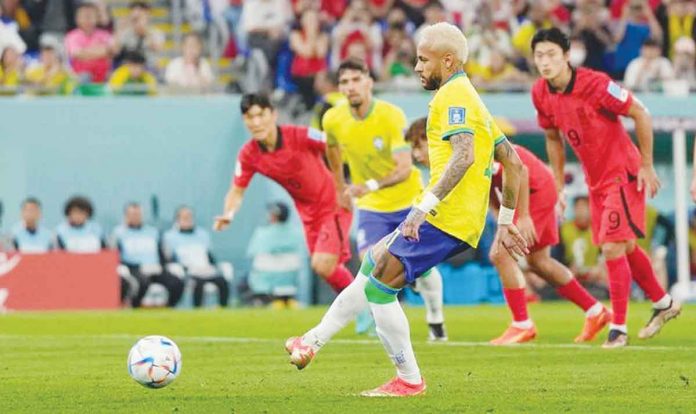 Neymar made the score 2-0 from the penalty spot after Richarlison was fouled. JIN-MAN LEE / AP