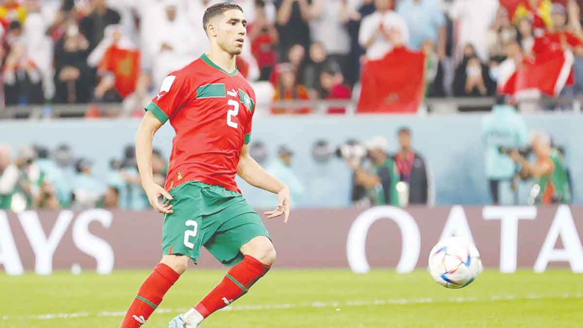 Achraf Hakimi converts a penalty kick to send Morocco to the