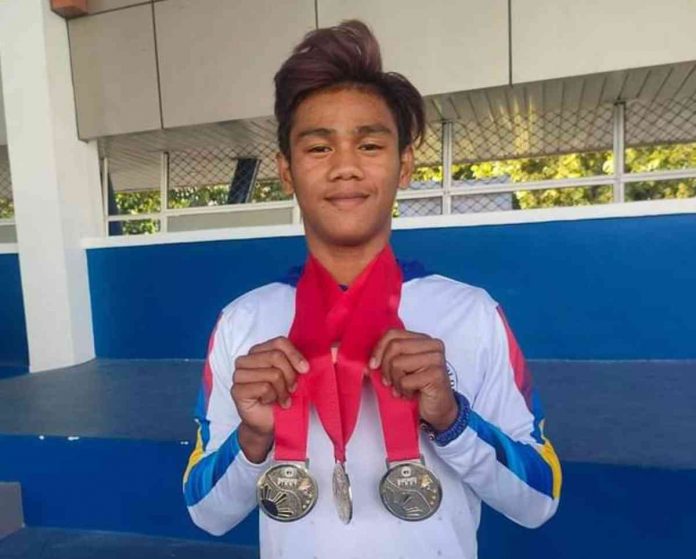 Mico Villaran of Bacolod City captures gold medals in the 100-meter, 200-meter and 400-meter hurdles in his one-and-done Batang Pinoy stint. FACEBOOK PHOTO