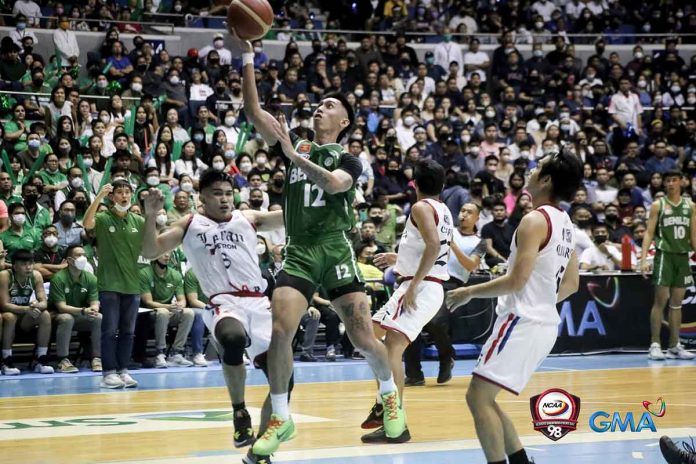 Negrense Miggy Corteza of College of St. Benilde Blazers goes for an easy inside basket. PHOTO BY GMA SPORTS/NCAA