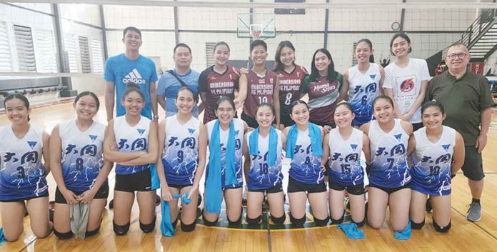 Members of Bacolod Tay Tung High School Thunderbolts have their pictures taken with some members of the University of the Philippines Fighting Maroons following their tune-up game on Wednesday. PHOTO COURTESY OF JOSE MONTALBO