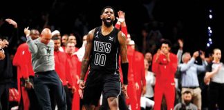 Royce O'Neale reacts after scoring the go-ahead basket for Brooklyn Nets against Miami Heat. GETTY IMAGES