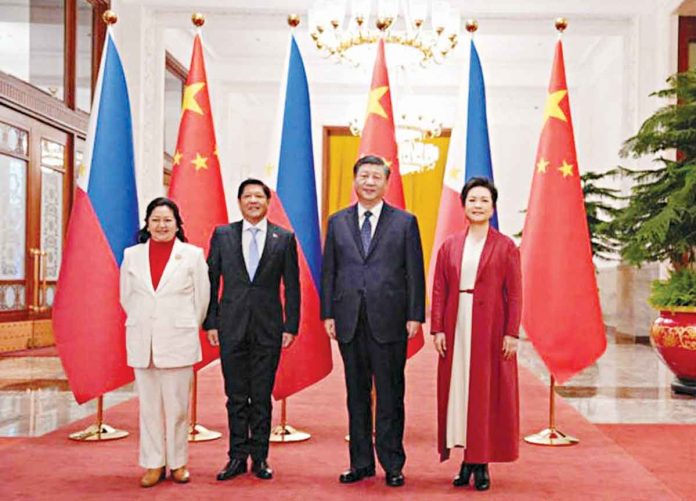 The Philippines’ President Ferdinand “Bongbong” Marcos Jr. and first lady Liza Araneta Marcos are photographed with China President Xi Jinping and his wife Peng Li Yuan during a welcoming ceremony at the Great Hall of the People in Beijing, China, Jan. 4, 2023. OFFICE OF THE PRESS SECRETARY / HANDOUT VIA REUTERS