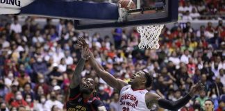 Bay Area Dragons’ Myles Powell evades the defense of Barangay Ginebra San Miguel Kings’ Justin Brownlee for a layup. PBA PHOTO