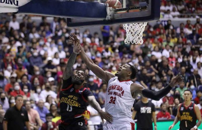 Bay Area Dragons’ Myles Powell evades the defense of Barangay Ginebra San Miguel Kings’ Justin Brownlee for a layup. PBA PHOTO