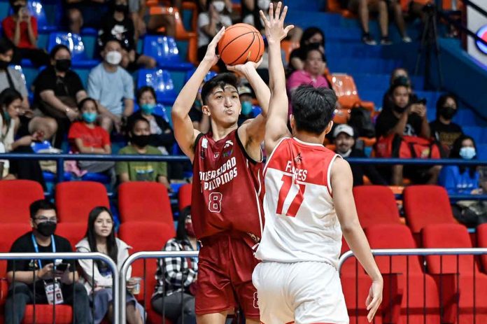 Heinz Gabriel “Kobe” Demisana is a 6-foot-8 gentle giant. UAAP PHOTO