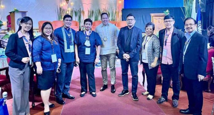 West Visayas State University (WVSU) president Dr. Joselito Villaruz (4th from right) presented the results of the research, “Leadership Configurations, and the Transformation of Philippine Teacher Education Institutions: An Exploratory Study” during a significant teacher education research forum on Feb. 13, 2023. With him are the WVSU contingent (left to right) composed of Dr. Rosemarie Felimon, Ms. Joanna Ferrer, Dr. Roberto Sagge Jr., Dr. Antoniette Cortez. From rightmost are former WVSU President Luis Sorolla Jr, Dr. Ricky Magno, and Dr. Ma. Asuncion Christine Dequilla. In barong beside Pres. Villaruz is Dr. Aldrin A. Dorilag, CHED commissioner.