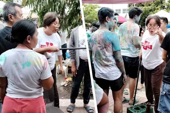 Former Commission on Elections commissioner Rowena Guanzon is seen confronting a man. She says her niece was ganged up on by several individuals during the highlights of the Dinagsa Festival in Cadiz City, Negros Occidental on Jan. 29. SCREENGRABBED FROM CYN THIA/FACEBOOK