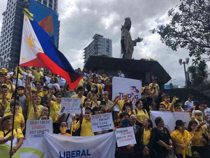 Activists stage a protest at the Edsa Shrine in Pasig City. NOY MORCOSO/INQUIRER.NET FILE PHOTO