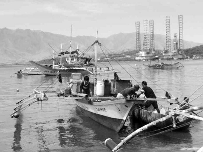 Fishermen in Zambales province prepare their fishing boat in this coastal village of Subic town. Many of the local fishermen used to sail to the disputed Scarborough Shoal where Chinese coast guards have recently driven away their fellow fisherfolk. PHOTO COURTESY OF JOANNA ROSE AGLIBOT