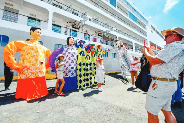 as they arrive at the Eva Macapagal Super Terminal in Manila on Feb. 15, 2023. MARK DEMAYO/ABS-CBN NEWS PHOTO