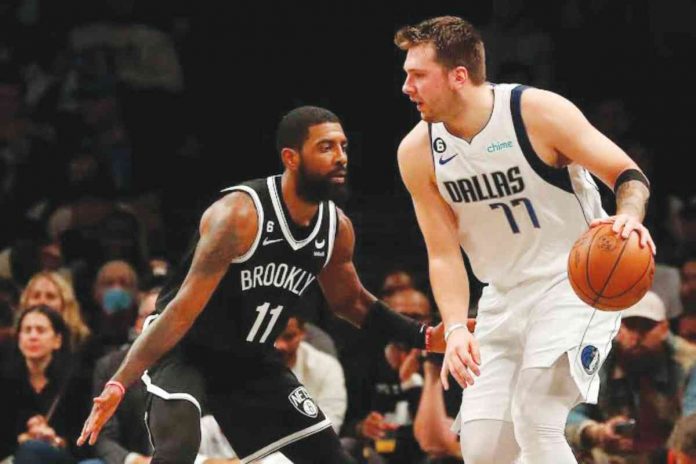 From being opponents, Kyrie Irving (left) is now teammates with Luka Doncic (right) at Dallas Mavericks. GETTY IMAGES