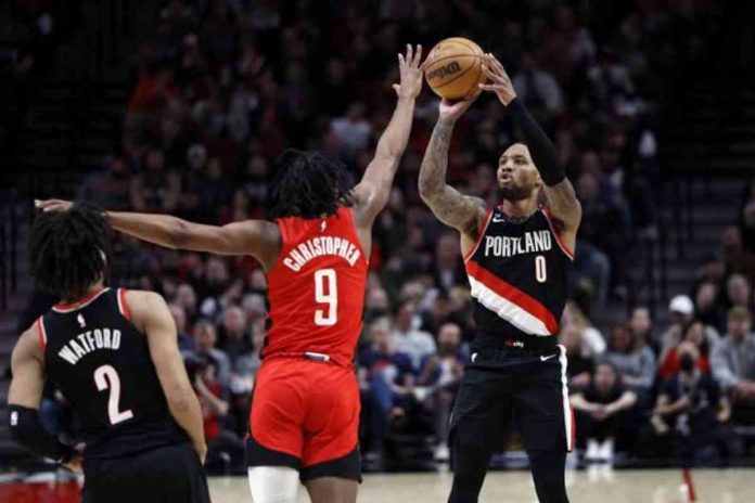 Portland Trail Blazers’ Damian Lillard shoots over the defense of Houston Rockets' Josh Christopher. YAHOO SPORTS PHOTO