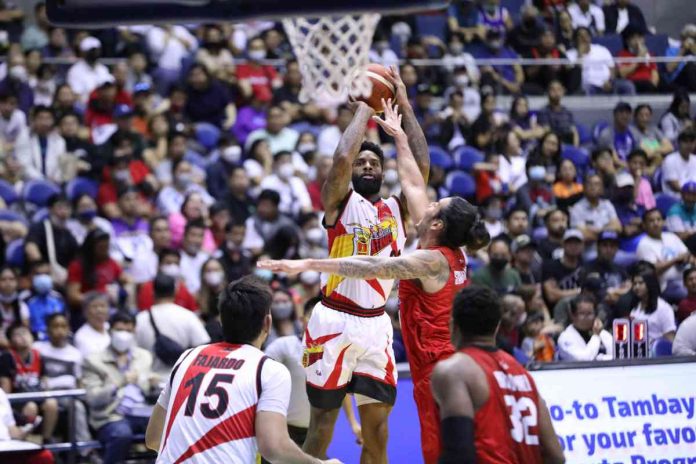 San Miguel Beermen’s Cameron Clark pulls up for a basket while being defended by Barangay Ginebra San Miguel Kings' Christian Standhardinger. PBA PHOTO