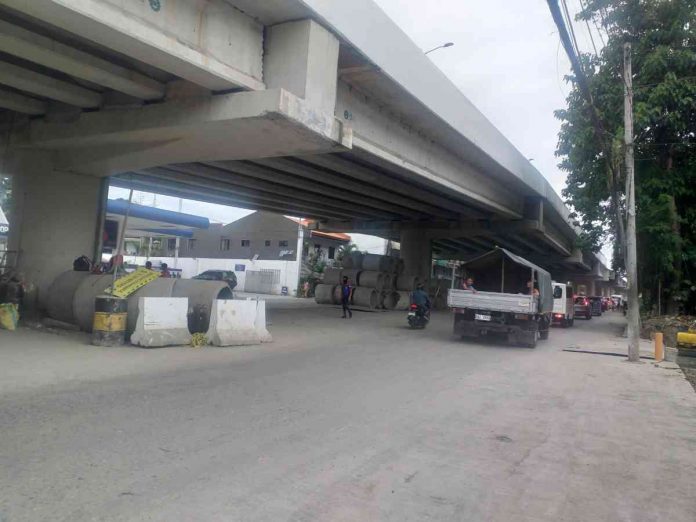 The widened road along the Ungka flyover in Barangay Ungka II, Pavia, Iloilo is now passable. IME SORNITO/PN