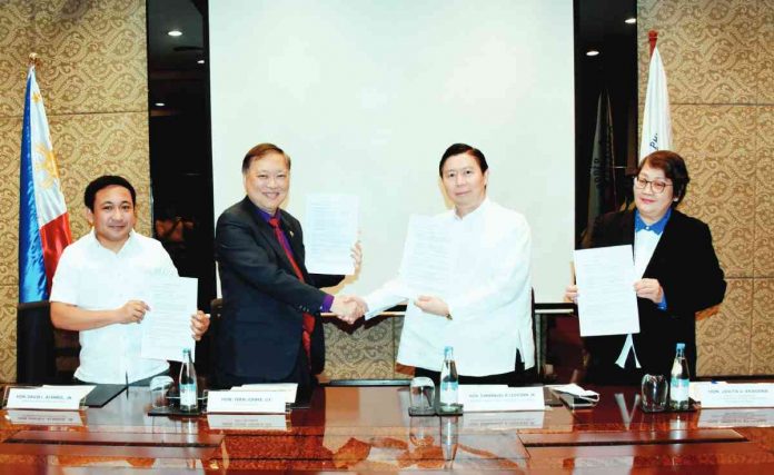 (From left) Department of Information and Communication Technology (DICT) undersecretary David L. Almirol Jr., DICT secretary Ivan E. John Uy, Philippine Health Insurance Corporation (PhilHealth) president and CEO Emmanuel R. Ledesma Jr., and PhilHealth senior vice president and chief information officer Jovita V. Aragona