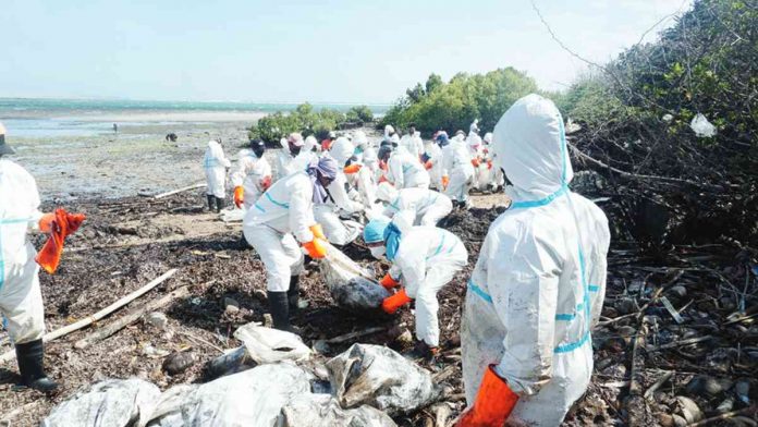 Semirara Mining and Power Corporation Emergency Response Team (SMPC ERT) and Barangay Semirara responders are working together to clean up and contain the Mindoro oil spill that reached Semirara Island.