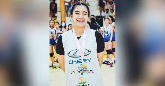 Katherine Shaine Cortez of Bacolod Tay Tung High School-A bags the MVP and Best Setter award in the 18-Under category of 2nd Congressman Greg Gasataya Age Group Volleyball Tournament. PHOTO BY HARRIS JORDAN BITALAC