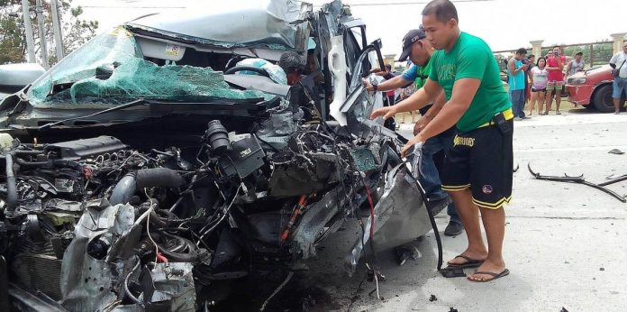 Driver Julius Desucatan, trapped in the mangled Ford Everest he was driving, died in a multiple-vehicle collision in Barangay Sambag, Zarraga, Iloilo on Wednesday morning, March 29. PHOTO COURTESY OF PANAY EMERGENCY