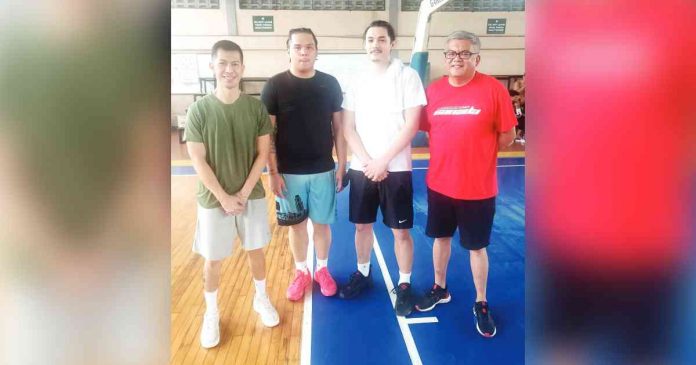 Filipino-Canadian guard Noah Libios Korovesi (second from right) is pictured with Iloilo United Royals-Cocolife head coach Manu Iñigo (left). Also in photo are Korovesi’s agent Mike Cruz (right) and fellow Filipino-Canadian player Jason Diaz of Arellano University (second from left). CONTRIBUTED PHOTO