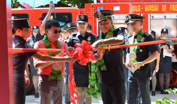 Mayor Maxfill Pollicar (second from left) and Bureau of Fire Protection regional director Chief Supt. Jerry Candido (fourth from left) cut the ribbon during the inauguration of the fire station in Anini-y on Wednesday, March 22. BFP R6 ANTIQUE PROVINCIAL OFFICE