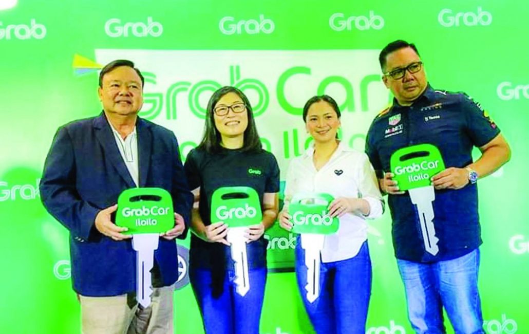 (from left) Mayor Jerry Treñas, Grab Philippines Country Head Grace Vera Cruz, Iloilo City Rep. Julienne Baronda, and LTFRB-6 regional director Richard Osmeña.