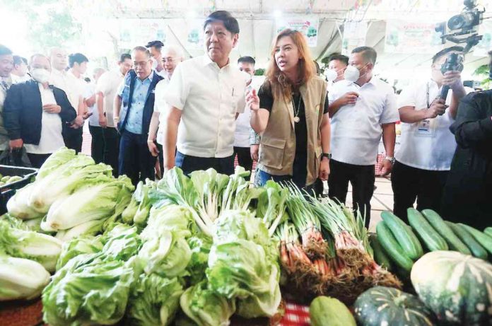 President Ferdinand Marcos Jr. visits the Kadiwa caravan at the Cebu Provincial Capitol grounds on Feb. 27, as the President expands the farm-to-market caravan to other regions. MARIANNE BERMUDEZ, PPA POOL PHOTO