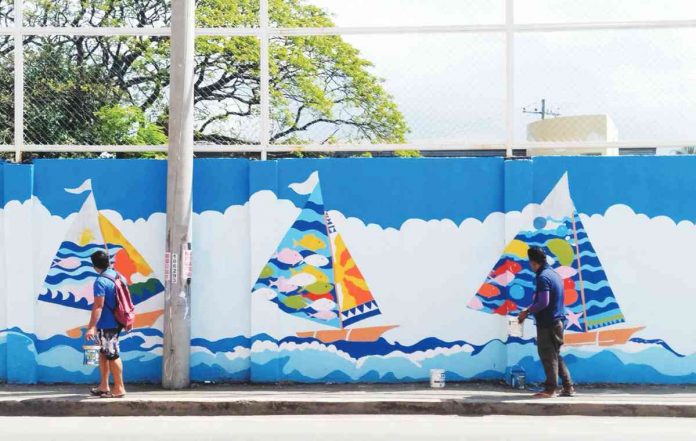 This wall along a street in Iloilo City is painted with colorful paraws just in time for the celebration of the 50th year of the Paraw Regatta Festival, the oldest sailing competition in the country. ARNOLD ALMACEN PHOTO