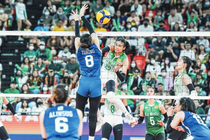 Bacolodnon Angel Canino of De La Salle University Lady Spikers fired a shot against National University Lady Bulldogs’ Sheena Toring. UAAP PHOTO