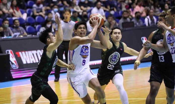 NLEX Road Warriors’ Celedonio Trollano protects the ball while being defended by Terrafirma Dyip’s Javi Gomez de Liano and Negrense John Paul Calvo. PBA PHOTO