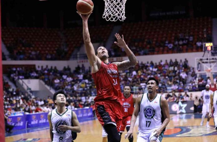 Barangay Ginebra San Miguel Kings’ Christian Standhardinger got an easy basket inside after eluding the Terrafirma Dyip defense. PBA PHOTO