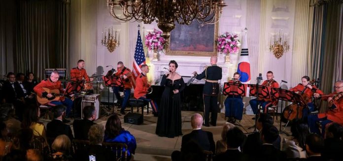 Broadway star Lea Salonga and The United States Marine Band Chamber Orchestra and the United States Army Band Herald Trumpets perform during the State Dinner for President Yoon Suk-yeol of the Republic of Korea hosted by US President Joe Biden held in the East Room of The White House in Washington, DC. OLIVER CONTRERAS, EPA-EFE/POOL PHOTO