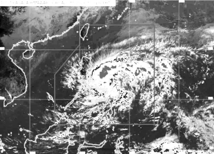 This weather satellite image from the Philippine Atmospheric, Geophysical and Astronomical Services Administration shows Tropical Depression “Amang” getting closer to hit land.