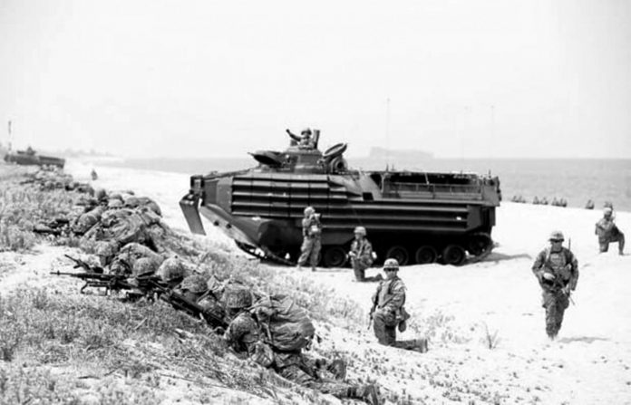 US and Philippine marines storm the beach to simulate a raid during the joint US-Philippines military exercise in San Antonio town, Zambales province, in this 2018 photo. INQUIRER FILE PHOTO