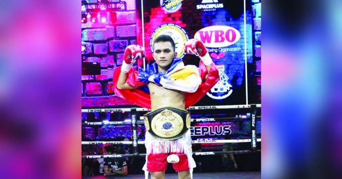 John Michael Zulueta of Calatrava, Negros Occidental is the Asian Boxing Federation’s light flyweight champion. CONTRIBUTED PHOTO