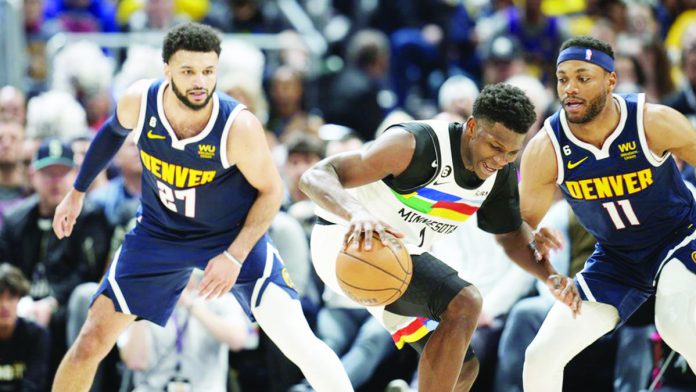 Jamal Murray gets the last laugh in his shootout against Anthony Edwards. AP