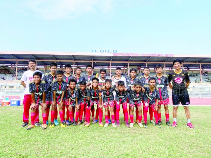 Members of the Schools Division of Iloilo-Barotac Nuevo elementary football team. CONTRIBUTED PHOTO